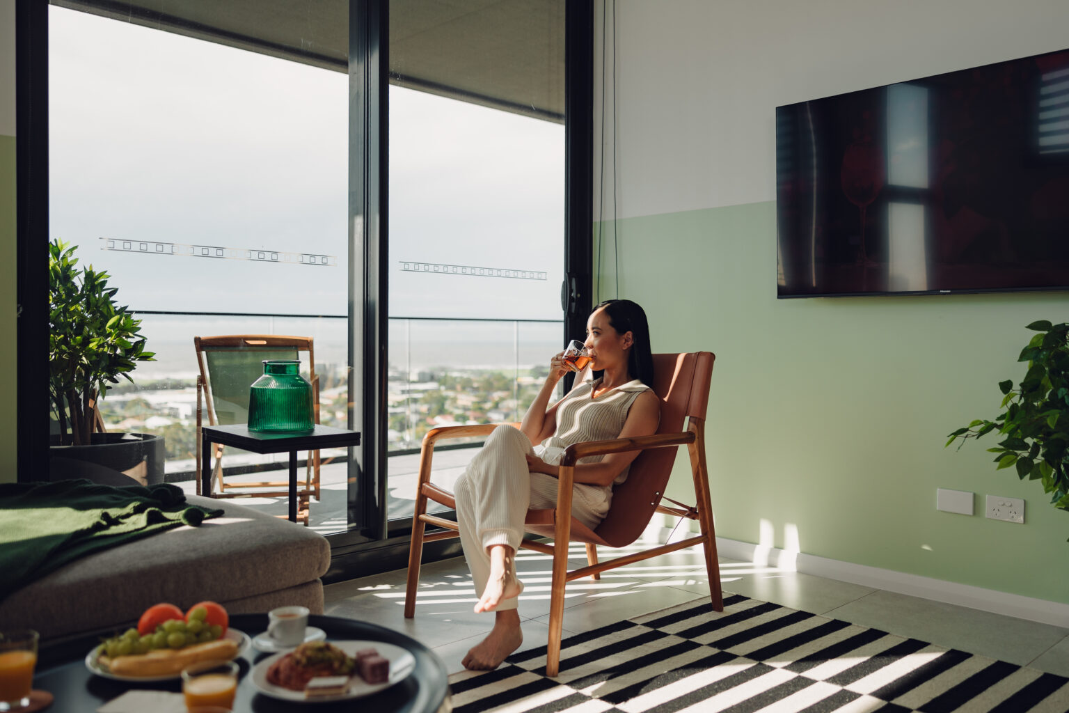 Guest settled in on a Wollongong apartment balcony